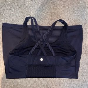 Black and dark grey striped lululemon tank top with built in bra